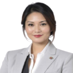 Professional portrait of a woman wearing a light gray blazer and white blouse, smiling at the camera.