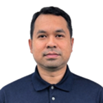 Head-and-shoulders portrait of a man wearing a navy polo shirt, facing the camera against a white background.