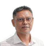 Portrait of a middle-aged man with short gray hair and glasses wearing a light collared shirt.